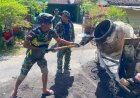 Semangat Gotong Royong Satgas TMMD ke-126 Bangun Drainase di Dusun Krajan Kab. Malang
